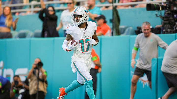 Dec 17, 2023; Miami Gardens, Florida, USA; Miami Dolphins wide receiver Jaylen Waddle (17) scores a