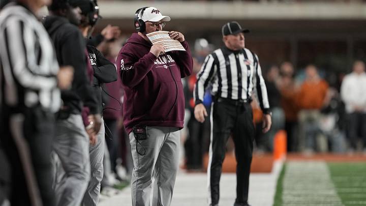 Nov 28, 2025; Austin, Texas, USA; Texas A&M Aggies head coach Mike Elko calls a play during the first half against the Texas Longhorns at Darrell K Royal-Texas Memorial Stadium. Nov 28, 2025; Austin, Texas, USA; Texas A&M Aggies head coach Mike Elko calls a play during the first half against the Texas Longhorns at Darrell K Royal-Texas Memorial Stadium.
