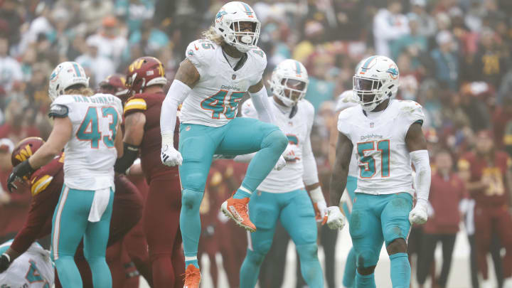 Miami Dolphins linebacker Duke Riley (45) celebrates after recording a sack against the Washington Commanders during the second quarter at FedExField last December. Miami Dolphins linebacker Duke Riley (45) celebrates after recording a sack against the Washington Commanders during the second quarter at FedExField last December.
