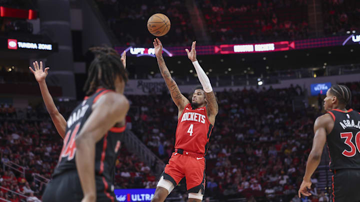 Feb 9, 2025; Houston, Texas, USA; Houston Rockets guard Jalen Green (4) shoots the ball during the fourth quarter against the Toronto Raptors at Toyota Center. Mandatory Credit: Troy Taormina-Imagn Images