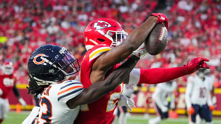 Aug 22, 2024; Kansas City, Missouri, USA; Kansas City Chiefs cornerback Kelvin Joseph (24) breaks up a pass intended for Chicago Bears wide receiver Nsimba Webster (83) during the game at GEHA Field at Arrowhead Stadium. Mandatory Credit: Denny Medley-Imagn Images