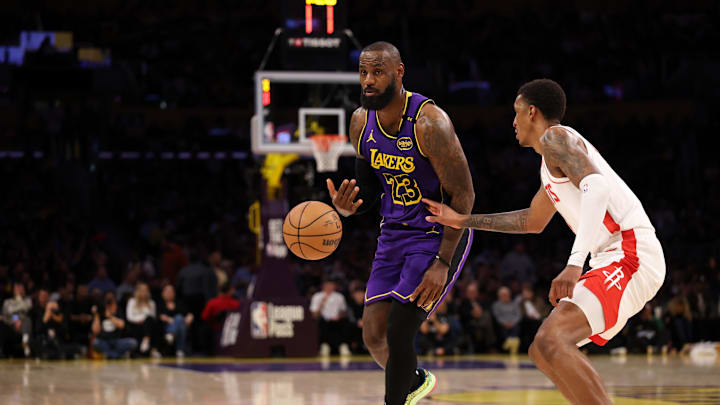 Mar 31, 2025; Los Angeles, California, USA;  Los Angeles Lakers forward LeBron James (23) passes the ball during the first half against the Houston Rockets at Crypto.com Arena. Mandatory Credit: Kiyoshi Mio-Imagn Images
