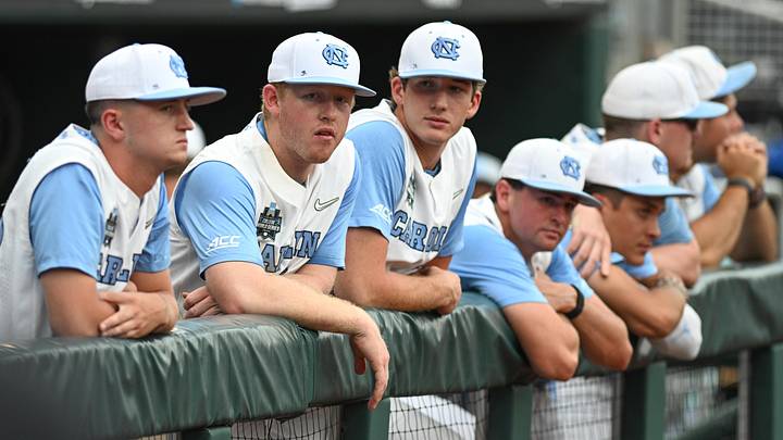 Jun 18, 2024; Omaha, NE, USA; North Carolina Tar Heels players look an after a loss against the Florida State Seminoles at Charles Schwab Field Omaha. Mandatory Credit: Steven Branscombe-Imagn Images Jun 18, 2024; Omaha, NE, USA; North Carolina Tar Heels players look an after a loss against the Florida State Seminoles at Charles Schwab Field Omaha. Mandatory Credit: Steven Branscombe-Imagn Images