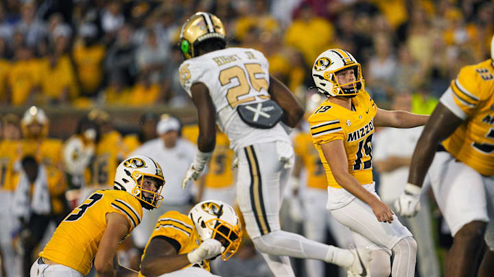 Sep 21, 2024; Columbia, Missouri, USA; Missouri Tigers place kicker Blake Craig (19) watches after kicking a field goal against the Vanderbilt Commodores during overtime at Faurot Field at Memorial Stadium. Mandatory Credit: Jay Biggerstaff-Imagn Images Sep 21, 2024; Columbia, Missouri, USA; Missouri Tigers place kicker Blake Craig (19) watches after kicking a field goal against the Vanderbilt Commodores during overtime at Faurot Field at Memorial Stadium. Mandatory Credit: Jay Biggerstaff-Imagn Images