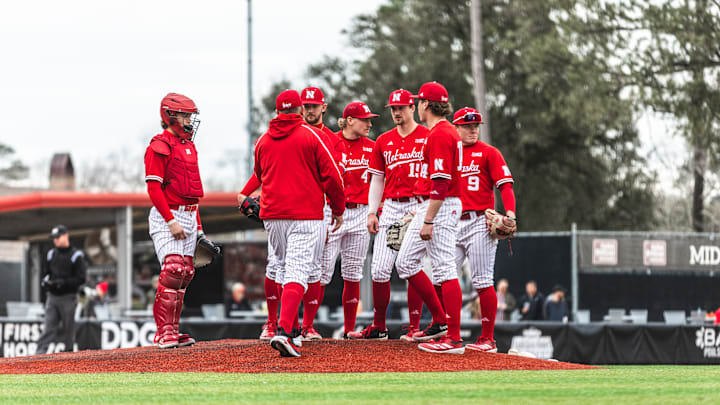 Nebraska baseball players meet on the mound during a game against Louisiana on Feb. 22, 2025. Nebraska baseball players meet on the mound during a game against Louisiana on Feb. 22, 2025.