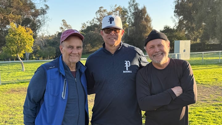 Palisades baseball coach Mike Voelkel (center) with Joe Torre (left) and Billy Crystal.