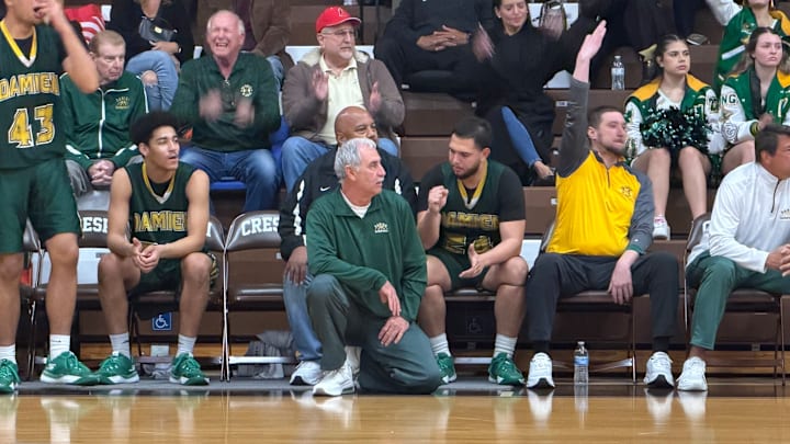 Damien coach Mike LeDuc guides his team to a CIF State Division I victory at Crespi Thursday night.