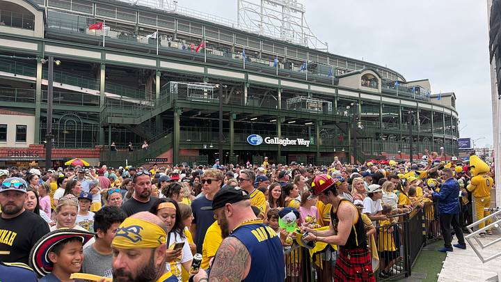 Banana Ball fans gather at Gallagher Way outside Wrigley Field in Chicago for player appearances before the Savannah Bananas and Firefighters Banana Ball game Banana Ball fans gather at Gallagher Way outside Wrigley Field in Chicago for player appearances before the Savannah Bananas and Firefighters Banana Ball game