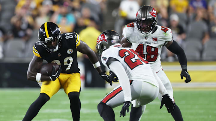 Aug 16, 2025; Pittsburgh, Pennsylvania, USA;  Pittsburgh Steelers wide receiver Roc Taylor (89) runs after a catch against Tampa Bay Buccaneers safety Shilo Sanders (28) and linebacker Antonio Grier Jr. (48) during the fourth quarter tamat Acrisure Stadium. Mandatory Credit: Charles LeClaire-Imagn Images