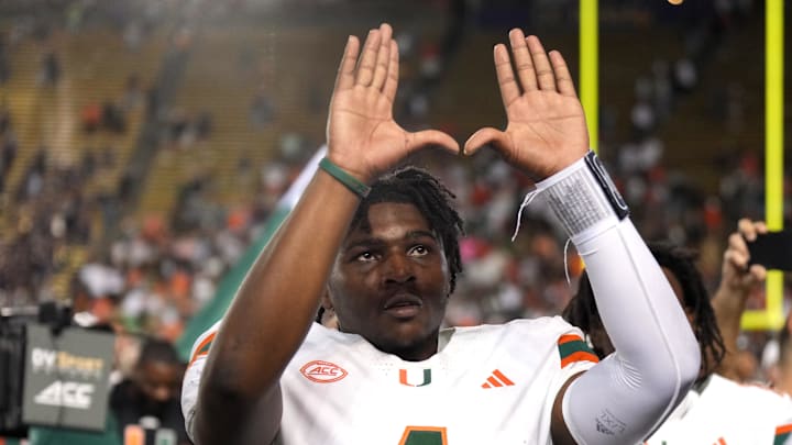 Oct 5, 2024; Berkeley, California, USA; Miami Hurricanes quarterback Cam Ward (1) gestures after defeating the California Golden Bears at California Memorial Stadium. Mandatory Credit: Darren Yamashita-Imagn Images