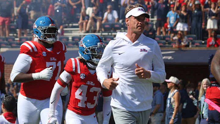Oct 11, 2025; Oxford, Mississippi, USA; Mississippi Rebels head coach Lane Kiffin leads his team out of the tunnel prior to the game against the Washington State Cougars at Vaught-Hemingway Stadium. Mandatory Credit: Petre Thomas-Imagn Images Oct 11, 2025; Oxford, Mississippi, USA; Mississippi Rebels head coach Lane Kiffin leads his team out of the tunnel prior to the game against the Washington State Cougars at Vaught-Hemingway Stadium. Mandatory Credit: Petre Thomas-Imagn Images