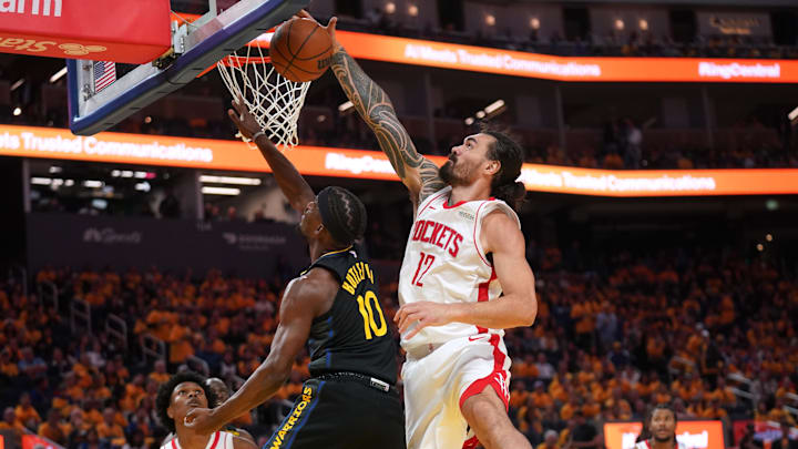 May 2, 2025; San Francisco, California, USA; Golden State Warriors forward Jimmy Butler III (10) has his shot blocked by Houston Rockets center Steven Adams (12) in the third quarter of game six of the first round for the 2025 NBA Playoffs at Chase Center. Mandatory Credit: Cary Edmondson-Imagn Images