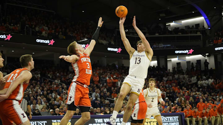 Dec 6, 2024; Evanston, Illinois, USA; Illinois Fighting Illini forward Ben Humrichous (3) defends Northwestern Wildcats guard Brooks Barnhizer (13) during the second half at Welsh-Ryan Arena. Mandatory Credit: David Banks-Imagn Images
