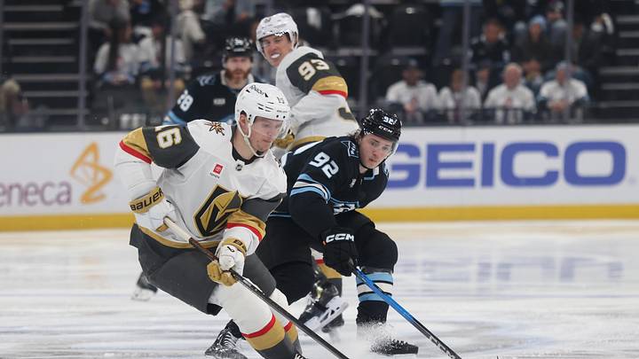 May 1, 2026; Salt Lake City, Utah, USA; Vegas Golden Knights right wing Pavel Dorofeyev (16) skates with the puck against Utah Mammoth center Logan Cooley (92) during the second period in game six of the first round of the 2026 Stanley Cup Playoffs at Delta Center. Mandatory Credit: Rob Gray-Imagn Images