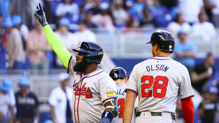 Apr 14, 2024; Miami, Florida, USA; Atlanta Braves designated hitter Marcell Ozuna (20) reacts after