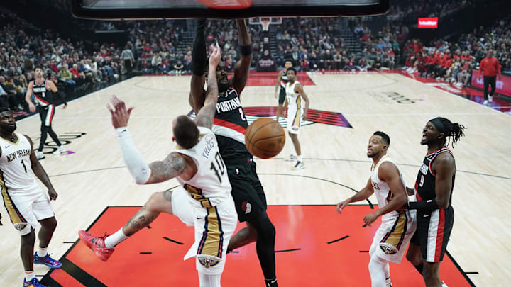 Oct 25, 2024; Portland, Oregon, USA; Portland Trail Blazers center Deandre Ayton (2) dunks the ball over New Orleans Pelicans center Daniel Theis (10) during the first half at Moda Center. Mandatory Credit: Soobum Im-Imagn Images Oct 25, 2024; Portland, Oregon, USA; Portland Trail Blazers center Deandre Ayton (2) dunks the ball over New Orleans Pelicans center Daniel Theis (10) during the first half at Moda Center. Mandatory Credit: Soobum Im-Imagn Images