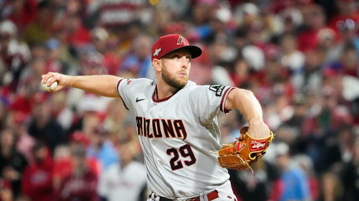 Merrill Kelly, reportedly heading to the Rangers, pitches against the Phillies.