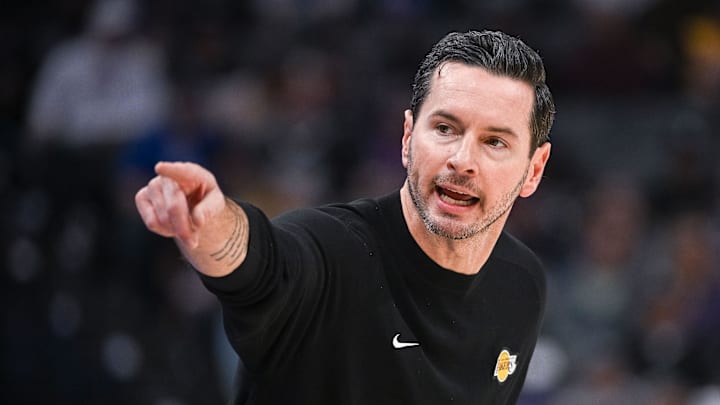 Oct 26, 2025; Sacramento, California, USA; Los Angeles Lakers head coach JJ Redick makes a call to the bench during the first quarter of the game against the Sacramento Kings at Golden 1 Center. Mandatory Credit: Ed Szczepanski-Imagn Images Oct 26, 2025; Sacramento, California, USA; Los Angeles Lakers head coach JJ Redick makes a call to the bench during the first quarter of the game against the Sacramento Kings at Golden 1 Center. Mandatory Credit: Ed Szczepanski-Imagn Images