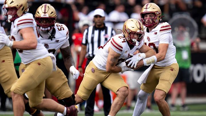 Boston College Eagles quarterback Mason McKenzie (10) hands off the ball to Boston College Eagles running back Bo MacCormack III (24) in the second quarter of the football game between Cincinnati Bearcats and Boston College Eagles at Nippert Stadium in Cincinnati on Saturday, Sept. 5, 2026.