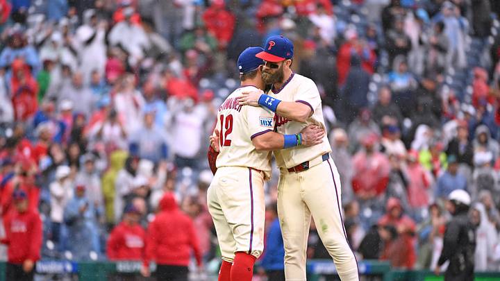 Sep 27, 2026; Philadelphia, Pennsylvania, USA; Philadelphia Phillies designated hitter Kyle Schwarber (12) and Philadelphia Phillies first baseman Bryce Harper (3) celebrate win against the Tampa Bay Rays at Citizens Bank Park. Mandatory Credit: Eric Hartline-Imagn Images
