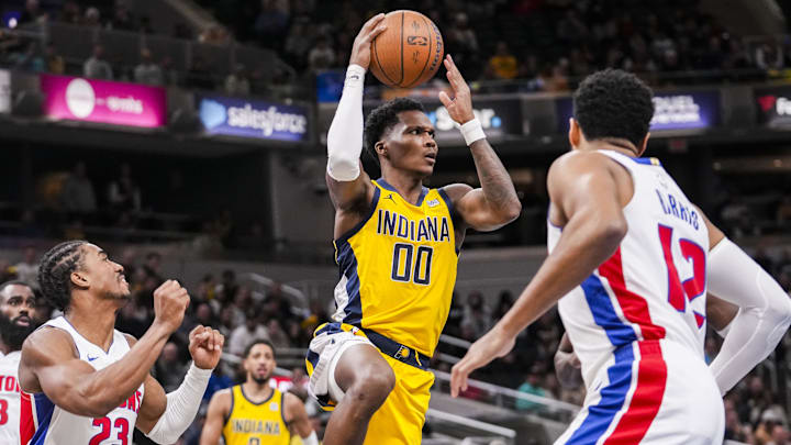 Nov 29, 2024; Indianapolis, IN, USA; Indiana Pacers guard Bennedict Mathurin (00) passes the ball out of the lane Friday, Nov. 29, 2024, during a game between the Indiana Pacers and the Detroit Pistons at Gainbridge Fieldhouse in Indianapolis.  Mandatory Credit: Grace Smith/USA TODAY Network via Imagn Images 