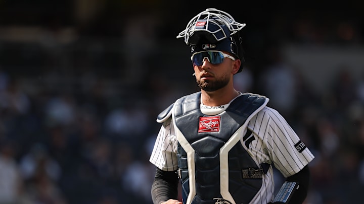 Jun 29, 2025; Bronx, New York, USA; New York Yankees catcher J.C. Escarra (25) walks off the field after the top of the eighth inning against the Athletics at Yankee Stadium. Mandatory Credit: Vincent Carchietta-Imagn Images