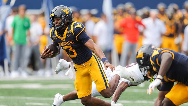 Sep 12, 2026; Morgantown, West Virginia, USA; West Virginia Mountaineers quarterback Michael Hawkins Jr. (3) runs the ball during the second quarter against the UT Martin Skyhawks at Milan Puskar Stadium. Mandatory Credit: Ben Queen-Imagn Images Sep 12, 2026; Morgantown, West Virginia, USA; West Virginia Mountaineers quarterback Michael Hawkins Jr. (3) runs the ball during the second quarter against the UT Martin Skyhawks at Milan Puskar Stadium. Mandatory Credit: Ben Queen-Imagn Images
