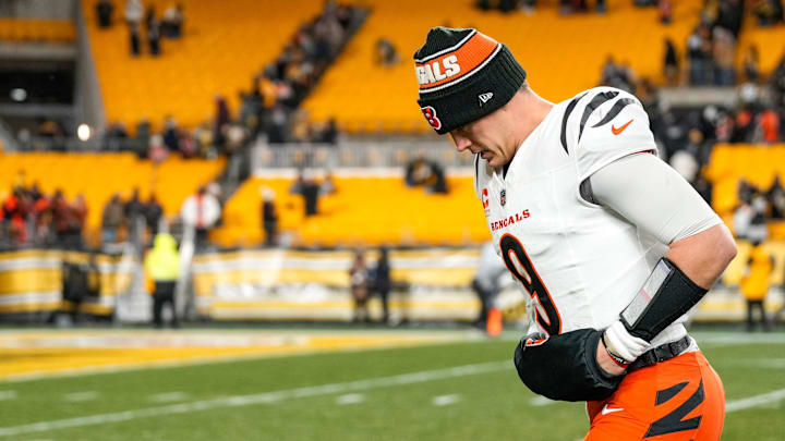 Cincinnati Bengals quarterback Joe Burrow (9) runs for the locker room after the fourth quarter of the NFL Week 18 game between the Pittsburgh Steelers and the Cincinnati Bengals at Acrisure Stadium in Pittsburgh on Saturday, Jan. 4, 2025. The Bengals won 19-17 to finish the regular season at 9-8.