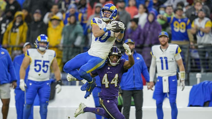 Dec 10, 2023; Baltimore, Maryland, USA;  Los Angeles Rams wide receiver Cooper Kupp (10) catches the ball against Baltimore Ravens cornerback Marlon Humphrey (44) during the fourth quarter at M&T Bank Stadium. Mandatory Credit: Jessica Rapfogel-Imagn Images
