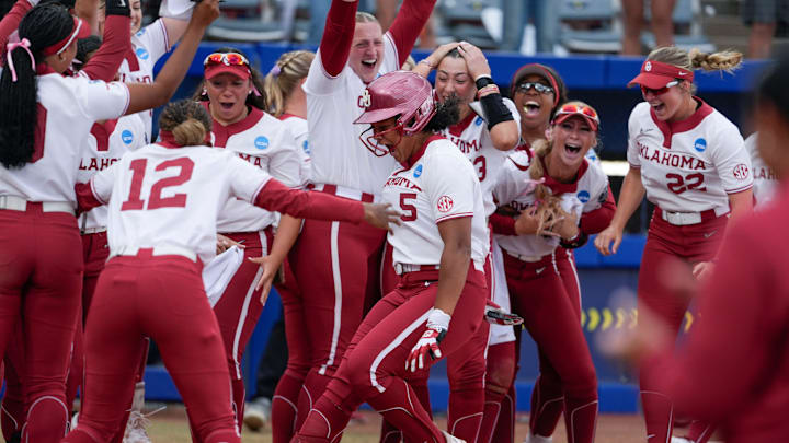 Oklahoma infielder Ella Parker (5) celebrates after hitting a walk-off home run to drive in three runs in the seventh inning of a Women's College World Series softball game between the Oklahoma Sooners (OU) and the Tennessee Volunteers at Devon Park in Oklahoma City, Thursday, May 29, 2025.