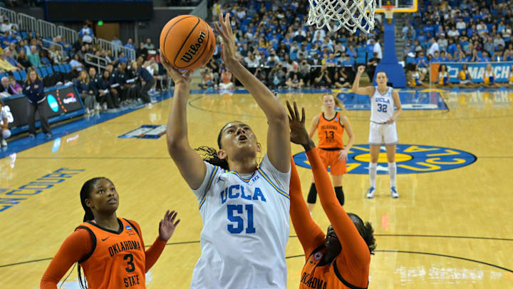 Mar 23, 2026; Los Angeles, CA, USA;  UCLA Bruins center Lauren Betts (51) drives past Oklahoma State Cowboys guard Micah Gray (3) and forward Achol Akot (11) in the first half at Pauley Pavilion. Mandatory Credit: Jayne Kamin-Oncea-Imagn Images