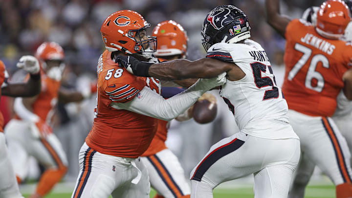 Sep 15, 2024; Houston, Texas, USA; Chicago Bears offensive tackle Darnell Wright (58) blocks against Houston Texans defensive end Danielle Hunter (55) during the game at NRG Stadium. Mandatory Credit: Troy Taormina-Imagn Images