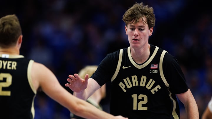 Purdue Boilermakers center Daniel Jacobsen (12) fives guard Fletcher Loyer (2) Purdue Boilermakers center Daniel Jacobsen (12) fives guard Fletcher Loyer (2)