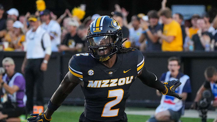 Aug 29, 2024; Columbia, Missouri, USA; Missouri Tigers cornerback Toriano Pride Jr. (2) celebrates after scoring against the Murray State Racers on a pick six during the first half at Faurot Field at Memorial Stadium. Mandatory Credit: Denny Medley-Imagn Images