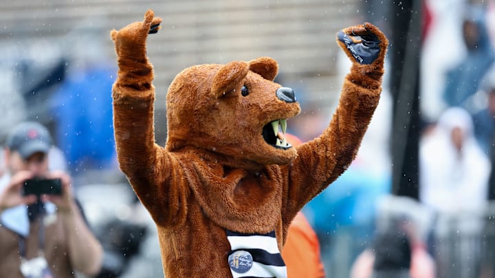 The Penn State Nittany Lions mascot entertains during the Blue-White Spring game at Beaver Stadium. The Penn State Nittany Lions mascot entertains during the Blue-White Spring game at Beaver Stadium.