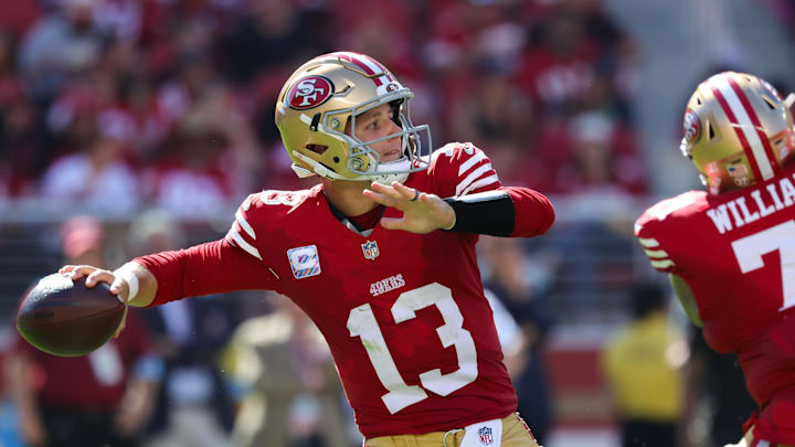 Sep 29, 2024; Santa Clara, California, USA; San Francisco 49ers quarterback Brock Purdy (13) throws a pass against the New England Patriots during the third quarter at Levi's Stadium. Mandatory Credit: Sergio Estrada-Imagn Images