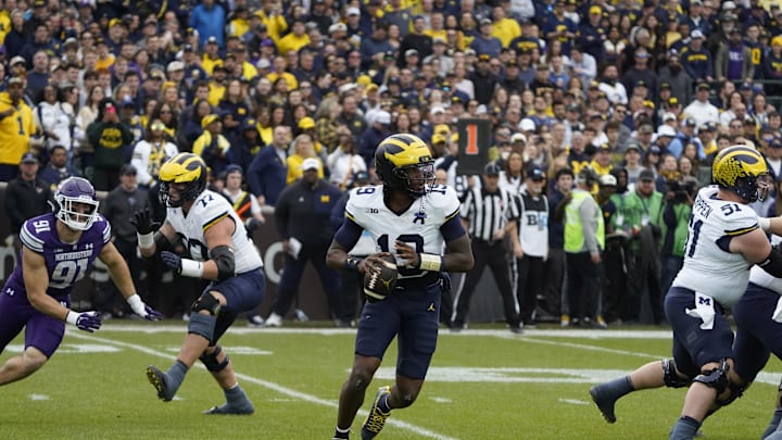 Nov 15, 2025; Chicago, Illinois, USA; Michigan Wolverines quarterback Bryce Underwood (19) throws the ball against the Northwestern Wildcats during the first half at Wrigley Field. Mandatory Credit: David Banks-Imagn Images Nov 15, 2025; Chicago, Illinois, USA; Michigan Wolverines quarterback Bryce Underwood (19) throws the ball against the Northwestern Wildcats during the first half at Wrigley Field. Mandatory Credit: David Banks-Imagn Images