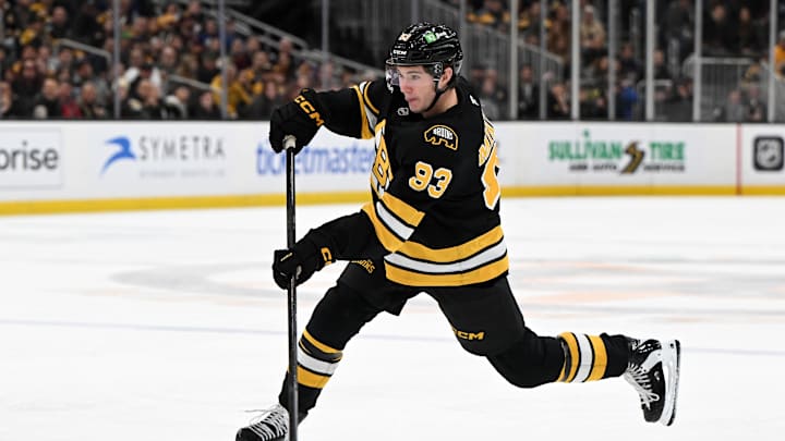 Nov 11, 2025; Boston, Massachusetts, USA; Boston Bruins center Fraser Minten (93) takes a shot Toronto Maple Leafs during the third period at the TD Garden. Mandatory Credit: Brian Fluharty-Imagn Images