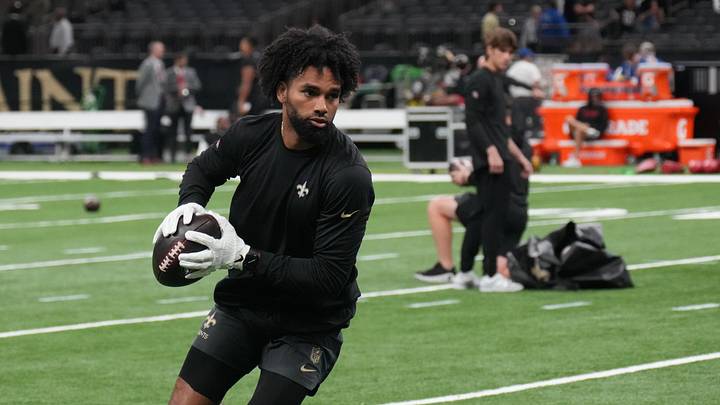 Nov 23, 2025; New Orleans, Louisiana, USA; New Orleans Saints wide receiver Chris Olave (12) warms up prior to a game against the Atlanta Falcons at Caesars Superdome. Mandatory Credit: Matthew Hinton-Imagn Images