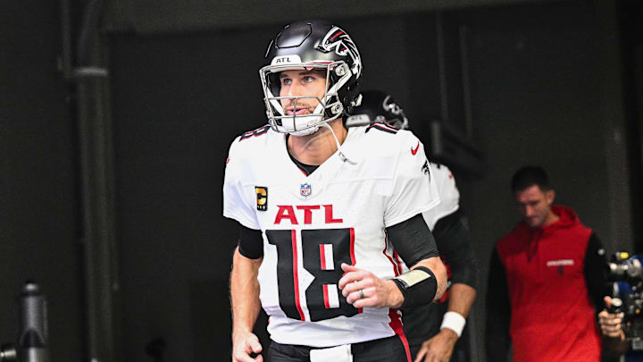 Dec 8, 2024; Minneapolis, Minnesota, USA; Atlanta Falcons quarterback Kirk Cousins (18) enters the field before the game against the Minnesota Vikings at U.S. Bank Stadium. Mandatory Credit: Jeffrey Becker-Imagn Images
