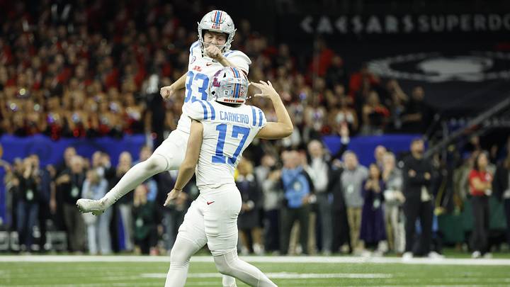 Jan 1, 2026; New Orleans, LA, USA; Ole Miss Rebels place kicker Lucas Carneiro (17) celebrates with Ole Miss Rebels punter Oscar Bird (33) after kicking the game winning field goal against the Georgia Bulldogs in the second half during the 2026 Sugar Bowl and quarterfinal game of the College Football Playoff at Caesars Superdome. Mandatory Credit: Amber Searls-Imagn Images Jan 1, 2026; New Orleans, LA, USA; Ole Miss Rebels place kicker Lucas Carneiro (17) celebrates with Ole Miss Rebels punter Oscar Bird (33) after kicking the game winning field goal against the Georgia Bulldogs in the second half during the 2026 Sugar Bowl and quarterfinal game of the College Football Playoff at Caesars Superdome. Mandatory Credit: Amber Searls-Imagn Images
