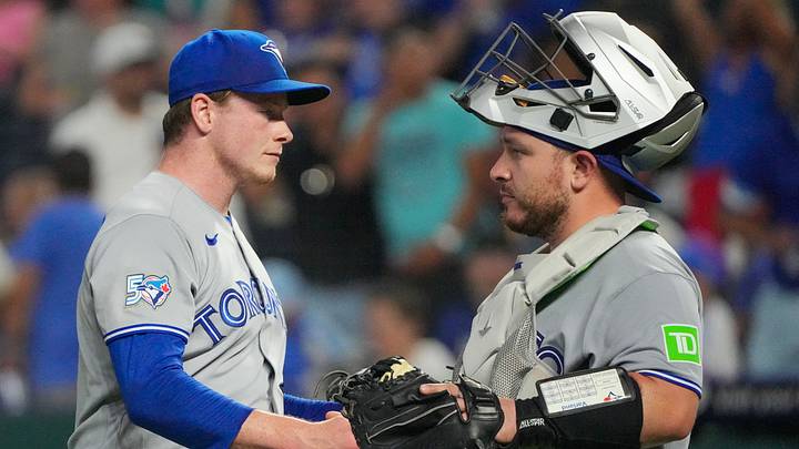 Sep 5, 2026; Kansas City, Missouri, USA; Toronto Blue Jays pitcher Louis Varland (77) celebrates with catcher Alejandro Kirk (30) after the win over the Kansas City Royals  at Kauffman Stadium. Mandatory Credit: Denny Medley-Imagn Images