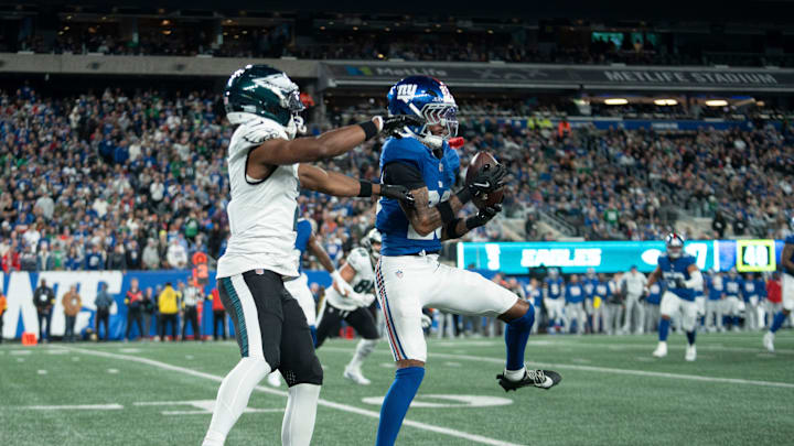 New York Giants cornerback Cordale Flott (28) intercepts a pass intended Philadelphia Eagles wide receiver Jahan Dotson (2) for during a Thursday Night Football game between the New York Giants and the Philadelphia Eagles at MetLife Stadium in East Rutherford on Oct. 9, 2025.