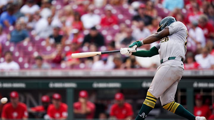 Oakland Athletics left fielder Daz Cameron (28) hits the ball during the fifth inning of the MLB game between the Cincinnati Reds and Oakland Athletics, Thursday, Aug. 29, 2024, at Cintas Center in Cincinnati in 2024.