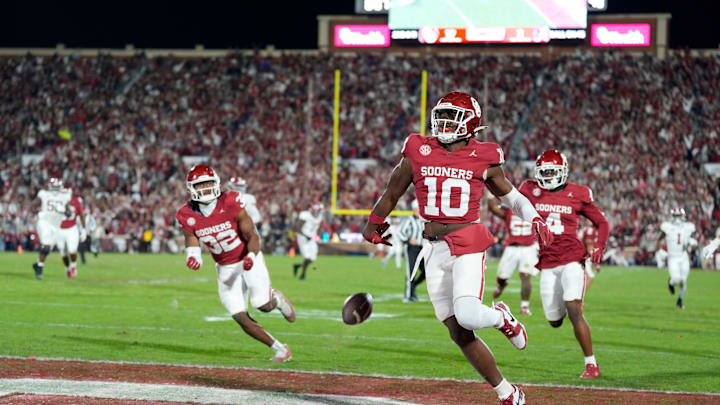 Oklahoma Sooners linebacker Kip Lewis (10) return an interception for a touchdown during a college football game between the University of Oklahoma Sooners (OU) and the Alabama Crimson Tide at Gaylord Family - Oklahoma Memorial Stadium in Norman, Okla., Saturday, Nov. 23, 2024. Oklahoma won 24-3.