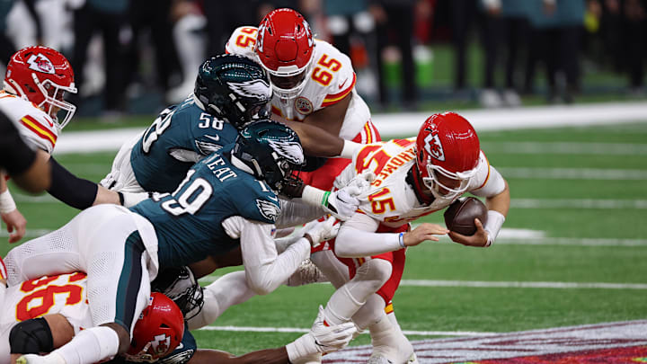 Feb 9, 2025; New Orleans, LA, USA; Philadelphia Eagles linebacker Jalyx Hunt (58) and linebacker Josh Sweat (19) tackle Kansas City Chiefs quarterback Patrick Mahomes (15) during the first half of Super Bowl LIX at Caesars Superdome. Mandatory Credit: Bill Streicher-Imagn Images Feb 9, 2025; New Orleans, LA, USA; Philadelphia Eagles linebacker Jalyx Hunt (58) and linebacker Josh Sweat (19) tackle Kansas City Chiefs quarterback Patrick Mahomes (15) during the first half of Super Bowl LIX at Caesars Superdome. Mandatory Credit: Bill Streicher-Imagn Images
