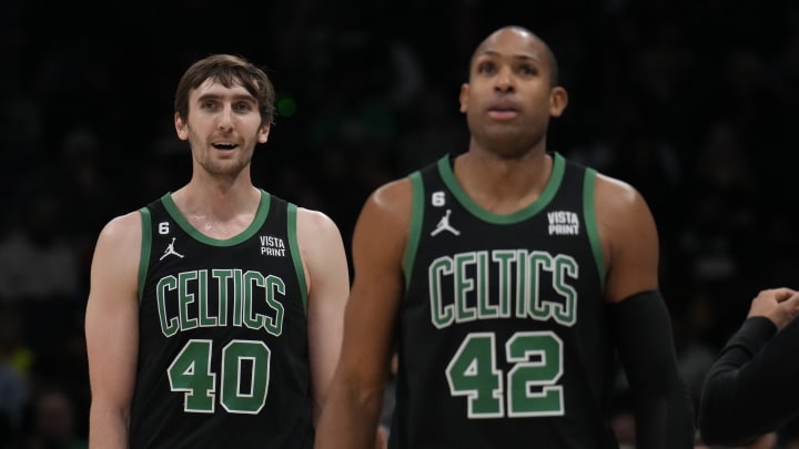 Jan 16, 2023; Charlotte, North Carolina, USA; Boston Celtics center Luke Kornet (40) and center Al Horford (42) walk off the court during a time out during the second quarter against the Charlotte Hornets at Spectrum Center. Mandatory Credit: Jim Dedmon-USA TODAY Sports Jan 16, 2023; Charlotte, North Carolina, USA; Boston Celtics center Luke Kornet (40) and center Al Horford (42) walk off the court during a time out during the second quarter against the Charlotte Hornets at Spectrum Center. Mandatory Credit: Jim Dedmon-USA TODAY Sports