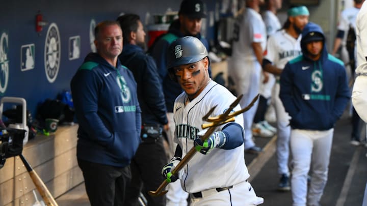 Seattle Mariners designated hitter Jorge Polanco (7) celebrates in the dugout after hitting a home run against the New York Yankees during the third inning at T-Mobile Park on May 12.