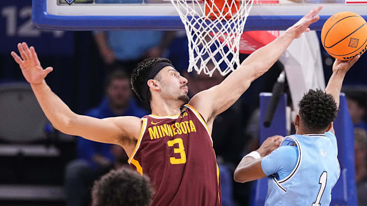 Minnesota Golden Gophers forward Dawson Garcia (3) attempts to block Indiana State Sycamores guard Julian Larry (1) on Sunday, March 24, 2024, during the second round of the NIT at the Hulman Center in Terre Haute. The Indiana State Sycamores defeated the Minnesota Golden Gophers, 76-64.