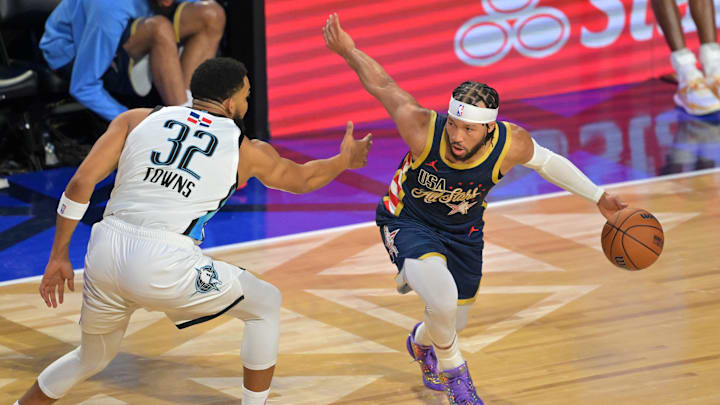Feb 15, 2026; Inglewood, California, USA; Team USA Stripes guard Jalen Brunson (11) of the New York Knicks controls the ball against Team World forward Karl-Anthony Towns (32) of the New York Knicks in game three during the 75th NBA All Star Game at Intuit Dome. Mandatory Credit: Jayne Kamin-Oncea-Imagn Images